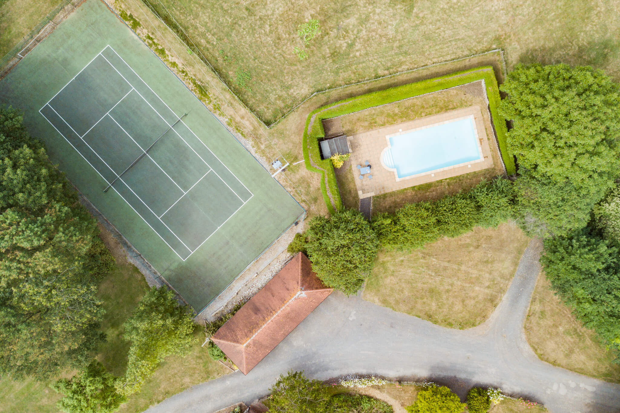 Tennis Court And Pool