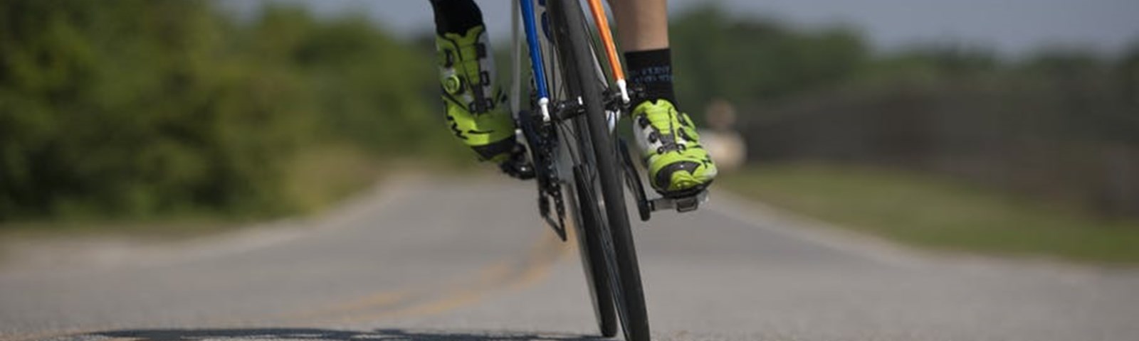 Person Riding Road Bike