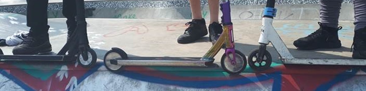 Scooters At Skatepark